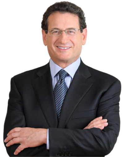 Professional headshot of smiling businessman in suit and tie with arms crossed, injury attorney portrait