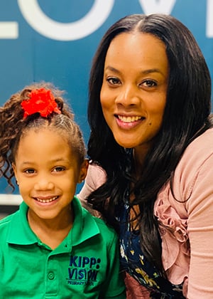 Smiling African American mother and daughter at Kidz View pediatric care, alt text for attorney website