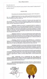 Attorney recommendation letter with gold seal, concise legal text, and official signatures