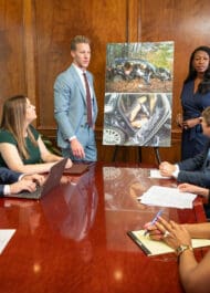 Georgia personal injury attorneys meeting to discuss a car accident case and fight for their client.