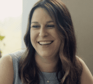 Smiling brunette woman looking friendly and approachable, an ideal image for an injury attorney website.