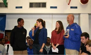 Students and faculty engaging during career day at school, discussing aspirations and future plans.