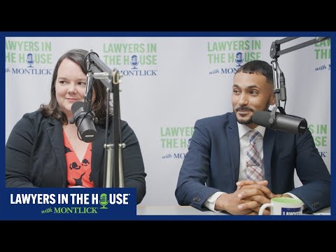 Male lawyer in suit speaks into microphone during radio interview at Lawyers in the House event.
