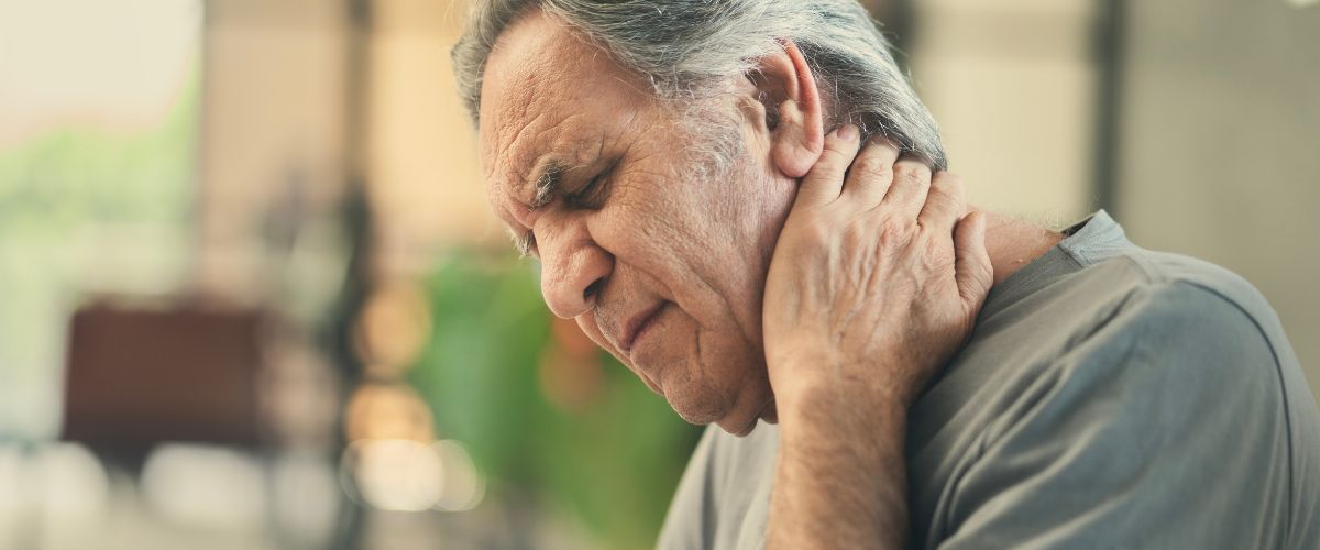 older white man suffering delayed pain after a car accident